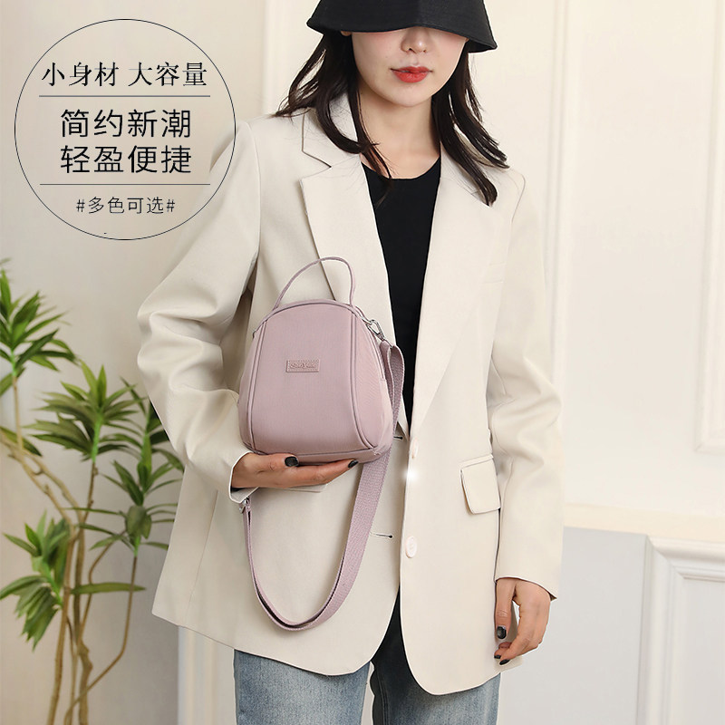 森系手提小包包防水精致便携式收通用款女包