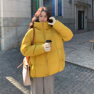 黄色韩系温柔风中长款连帽羽绒服女2026年冬季新款防风保暖面包服