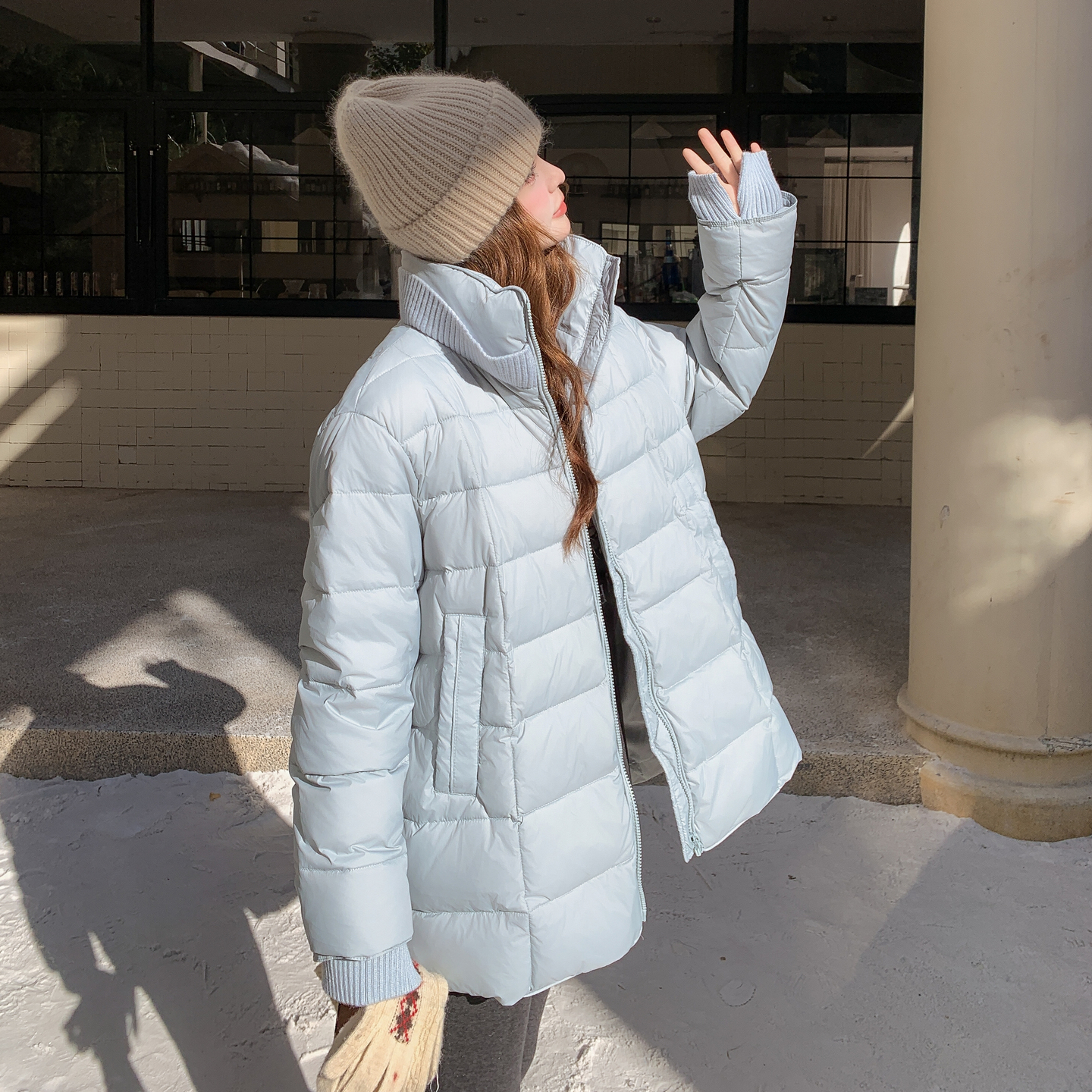 浅蓝色针织拼接立领羽绒服女