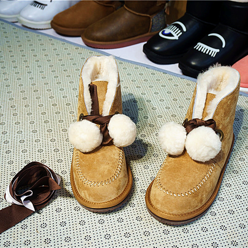 真皮一体丝带毛球橡胶底雪地靴