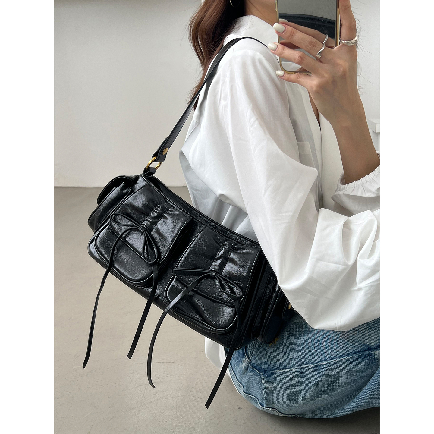 小众设计蝴蝶结多口袋单肩腋下包