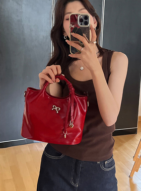 原创托特包2025新款高级感油蜡牛皮手提包通勤斜挎大包红色新娘包