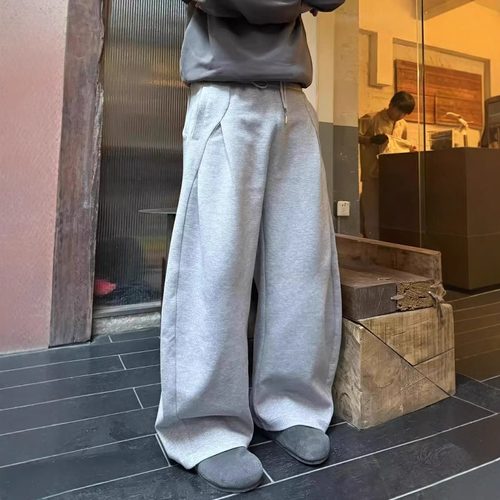 美式复古春季结构剪裁弯刀卫裤男