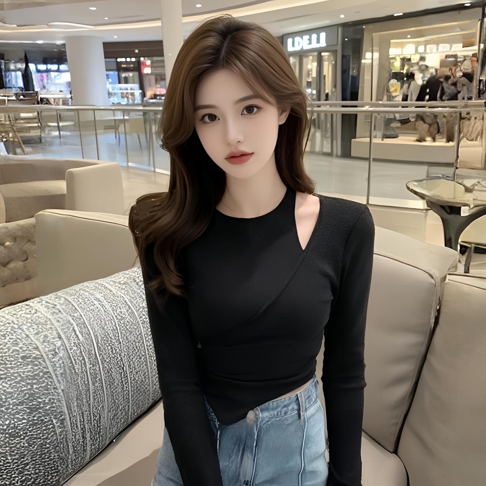 辣妹黑色不规则镂空独特绝美小上衣女秋季修身长袖t恤短款打底衫