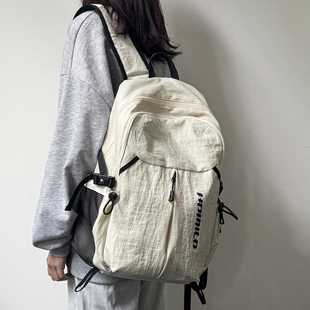 日系轻便减负双肩包女大容量初中高中通勤书包户外登山旅游背包男