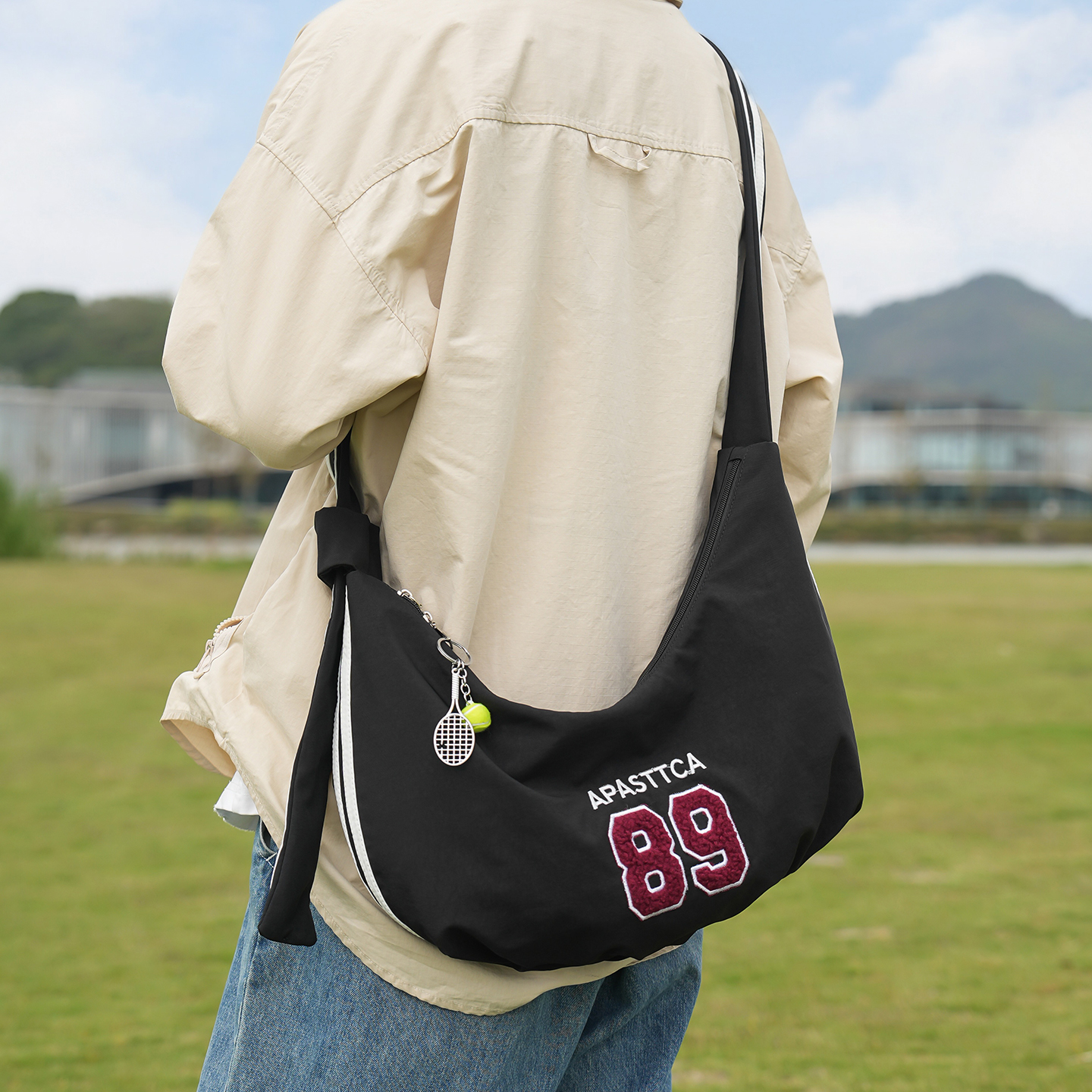 休闲斜挎包轻便通勤饺子包