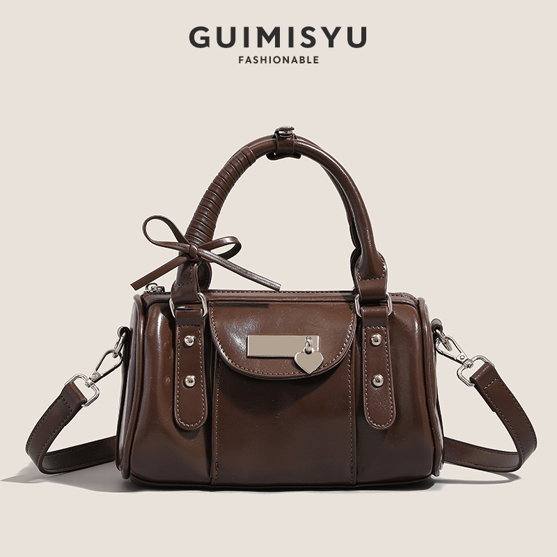 纳兰女包原创枕头包2025新款圆筒包休闲百搭单肩斜挎包保龄球包包