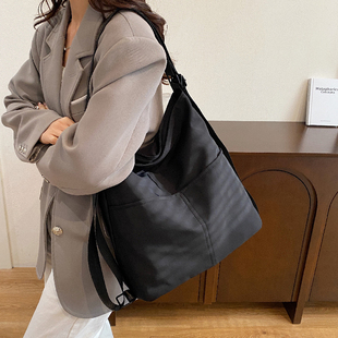 原创一包多用通勤包包女大容量休闲学生双肩包百搭简约单肩帆布包