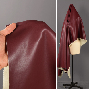 0.7mm厚酒红色蛋白皮革软皮料 夹克布料 超柔微弹顺滑垂感皮衣皮裤