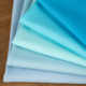 子服装 裙子裤 面料 50支双面针织四面弹力 天蓝湖蓝色锦棉罗马布料