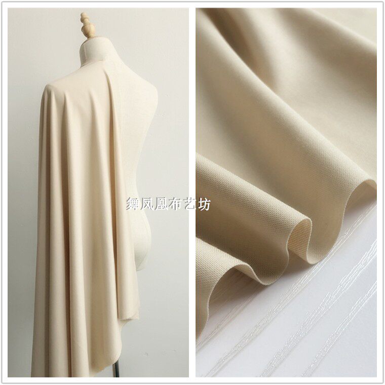 米杏色米黄色 天丝哥弟面料 春夏针织四面弹力裤子裙子服装布料