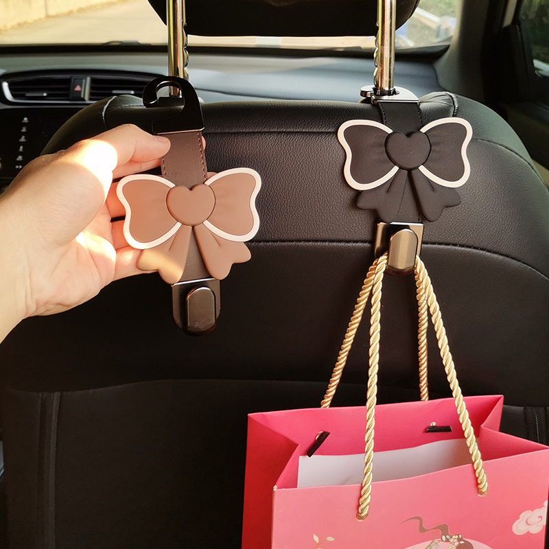 可爱蝴蝶结汽车座椅后背挂钩后排车内收纳车载好物新车装饰品女生