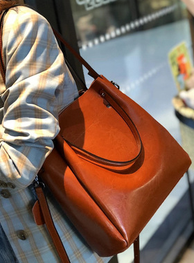 牛皮包包女2025新款单肩包手提斜挎包女感轻奢大容量真皮女包