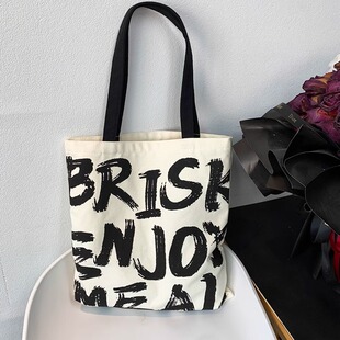 英文字母帆布包男女单肩大容量学生上课通勤装书带拉链结实手提包