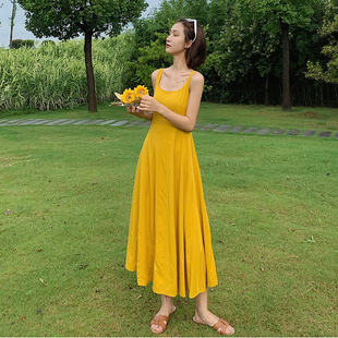 海南三亚白色度假风吊带显瘦仙女超长款优雅女法式连衣裙2023