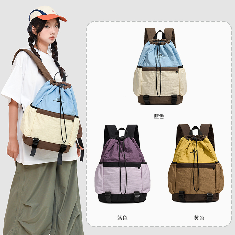 2025新款韩版休闲抽绳户外双肩包男女百搭出游登山大容量潮包布包