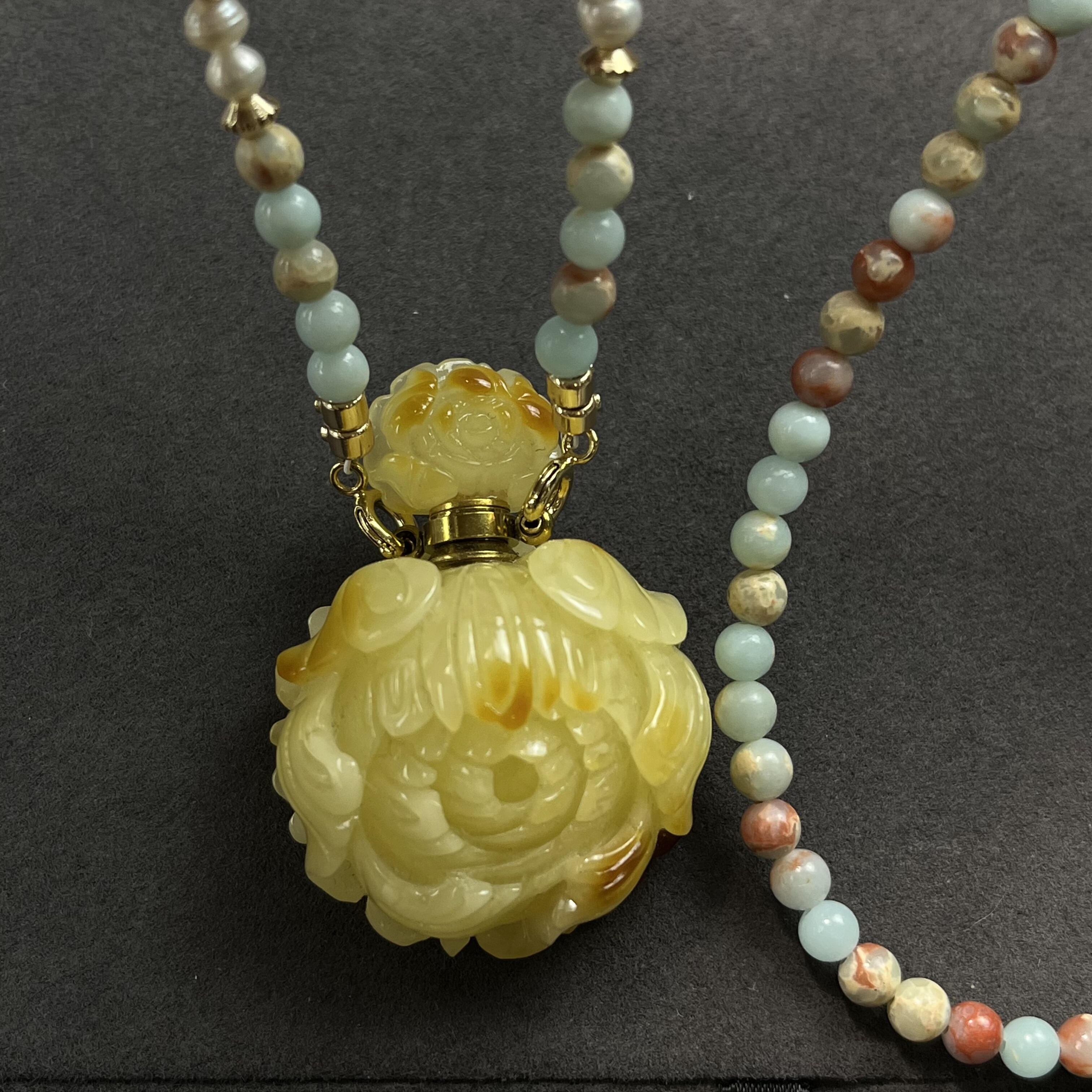 蜜蜡牡丹花香水瓶精油瓶项链女款空瓶可滴入精油香水胎毛朱砂粉末