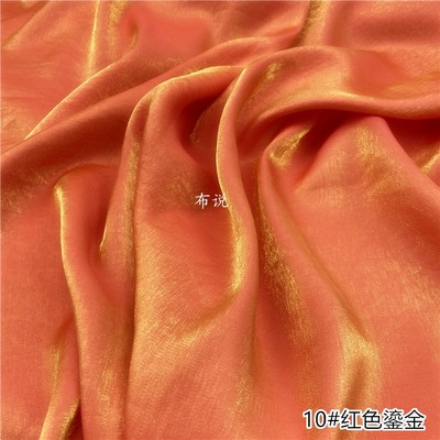 桔红色纯棉光泽金银丝布料