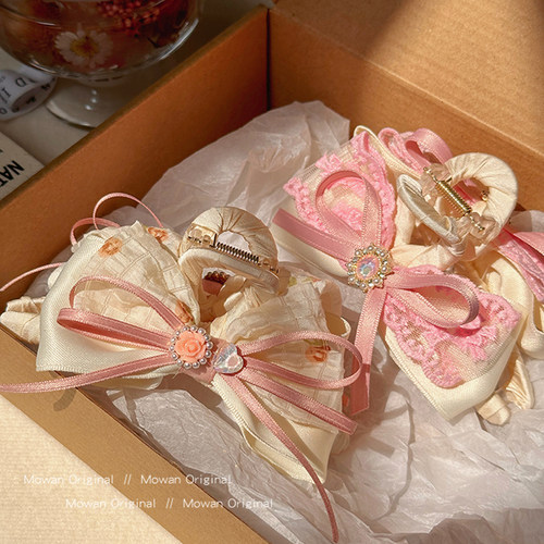 甜美粉色水钻蝴蝶结发夹