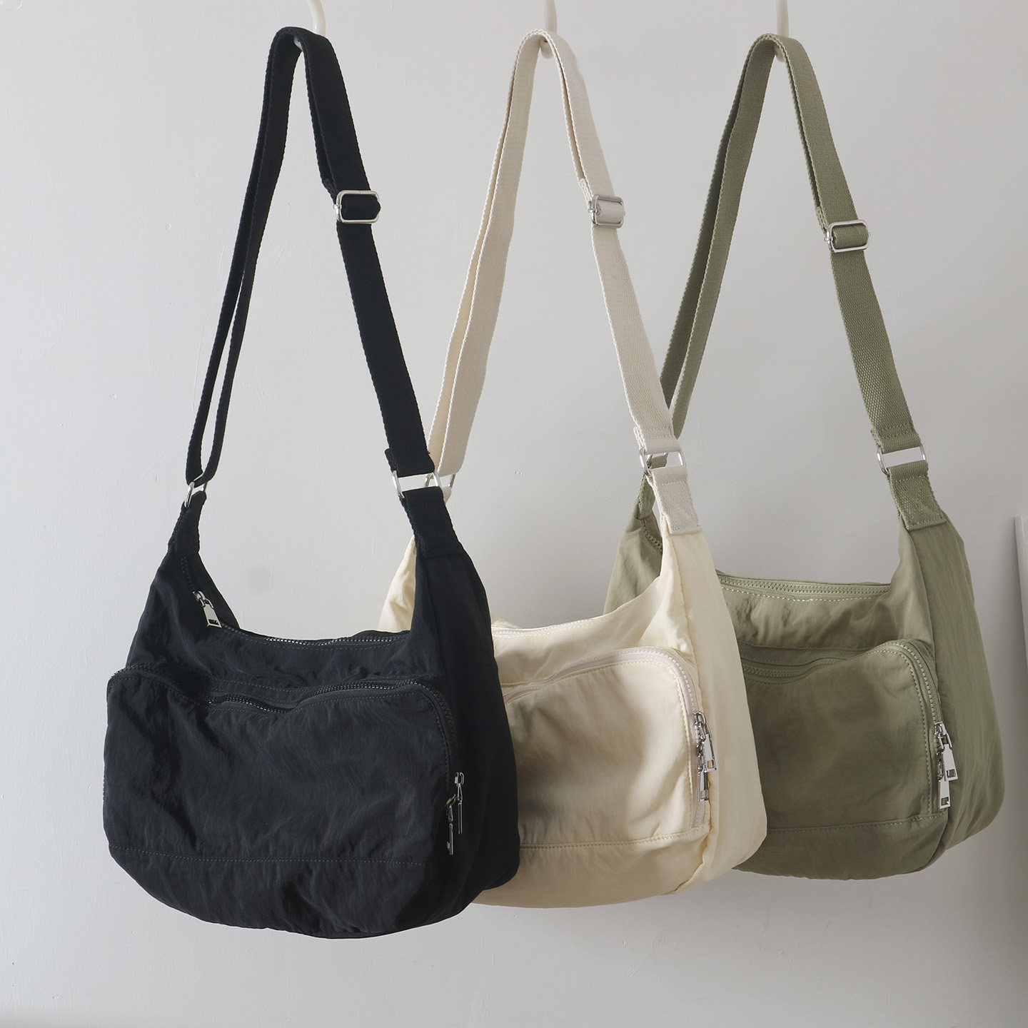 2026春上新韩版文艺学院风休闲百搭中性防水单肩斜挎布包男女款