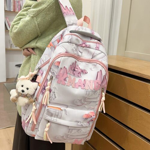 法国DUDK新款休闲简约双肩包女减负护脊初高中学生书包大容量背包