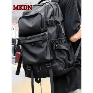 法国MK DN2025冬潮酷双肩包男士大容量旅游背包大学生书包电脑包