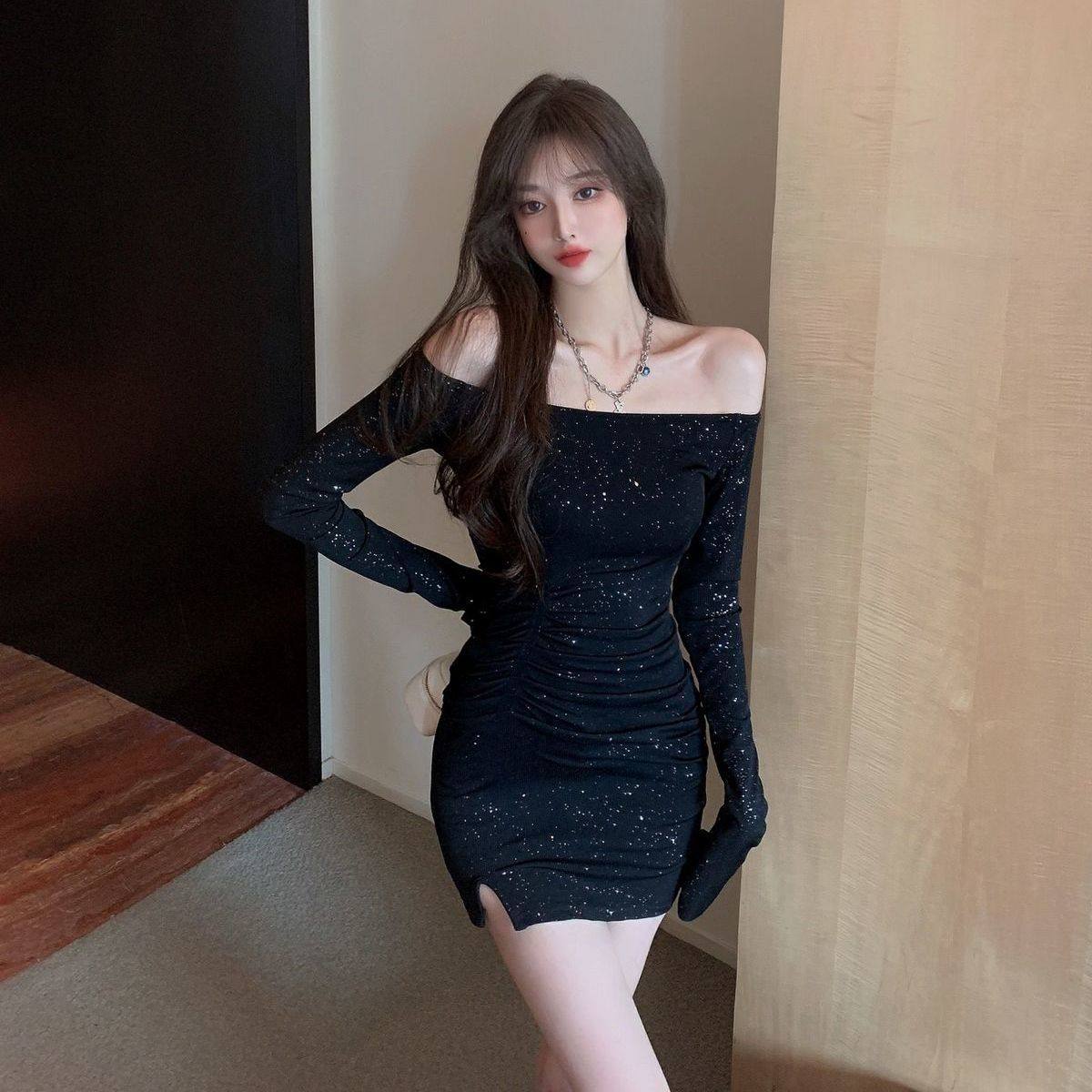 一字肩连衣裙女修身镶钻长袖不规则包臀短裙2025秋季新款黑色裙