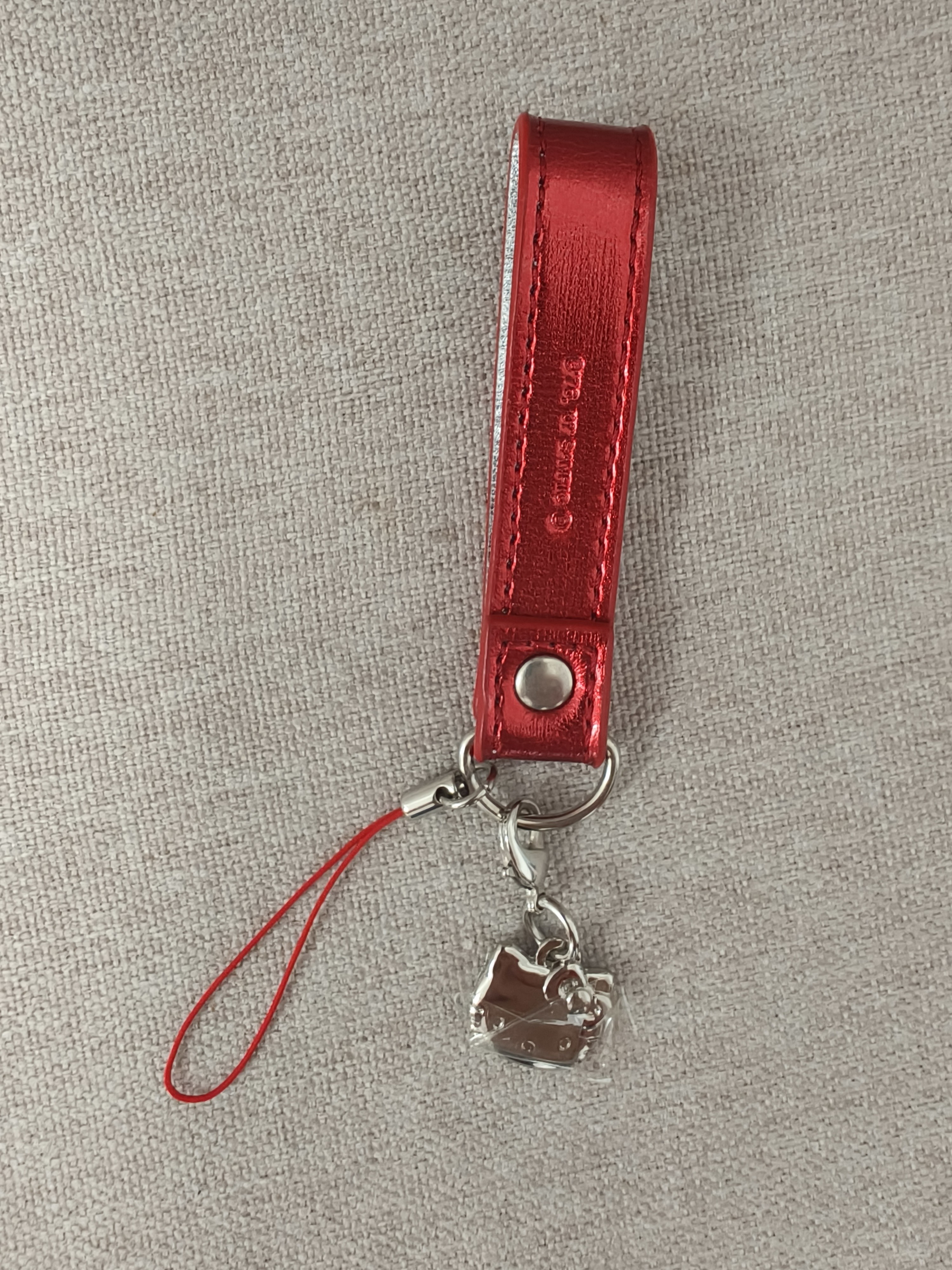 Hellokitty中古稀有2007年大红猫头手机链，全新