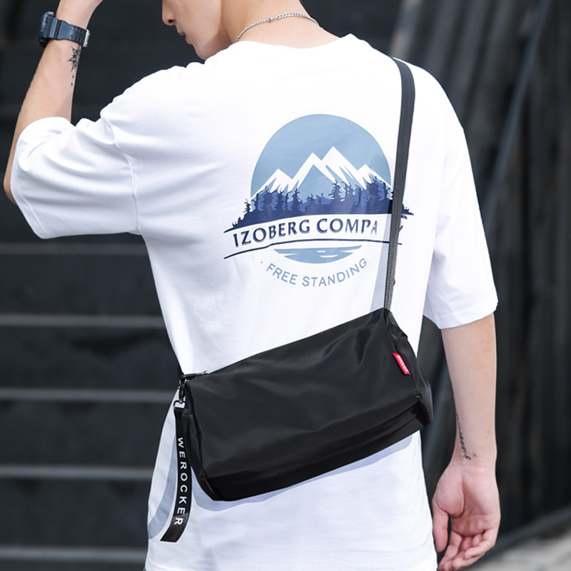 单肩斜挎包男潮牌运动小包休闲旅行桶包女嘻哈简约男包潮流斜背包