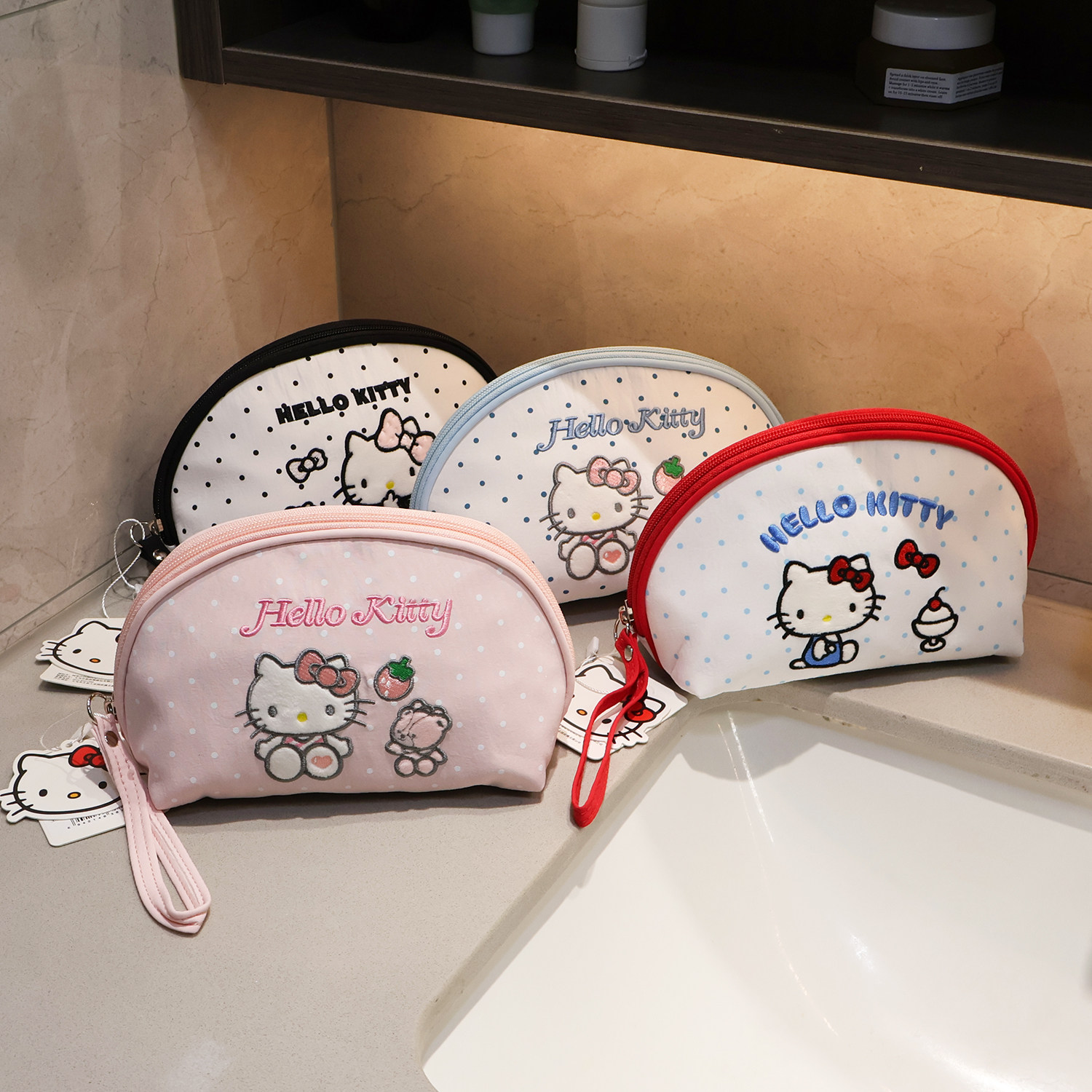 Hellokitty凯蒂猫贝壳形手拎化妆包女可爱便携小巧旅行洗漱收纳包图片
