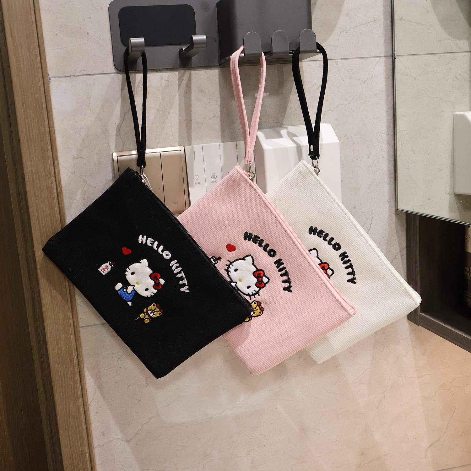 Hellokitty化妆包女手拎拉链便携姨妈巾口红钥匙手机随身补妆小包