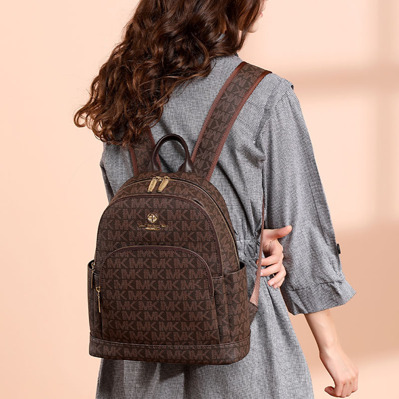 轻奢品牌mk双肩包女2022新款女士名牌多功能学生背包真皮书包代购