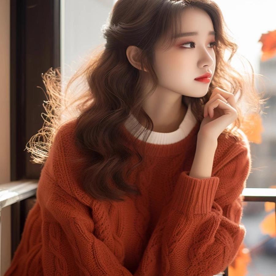 今年流行的漂亮橘红毛衣针织上衣