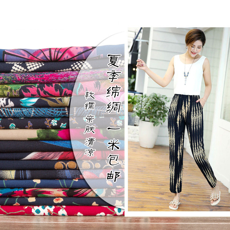 雕印绵绸面料人造棉布料夏季印花黑底小碎花时尚连衣裙服装面料