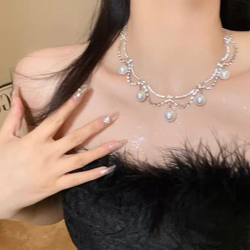 气质温柔山茶花仿珍珠项链小众设计流苏颈链高级感轻奢水钻锁骨链