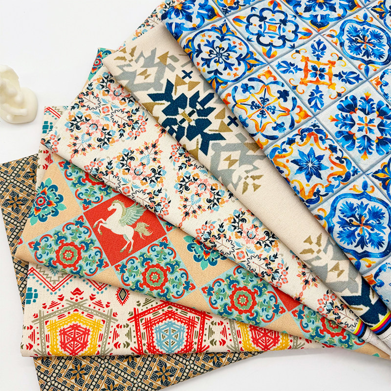 国潮新元素印花布加密棉麻布料装饰diy布头包书布桌布窗帘沙发布