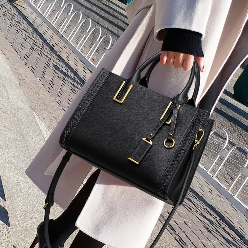 真皮包包女士2024新款潮感时尚通勤女包手提包黑色单肩斜挎包