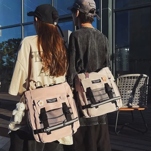 大号斜挎包男单肩帆布包日系工装大容量学生男生反光书包女手提袋