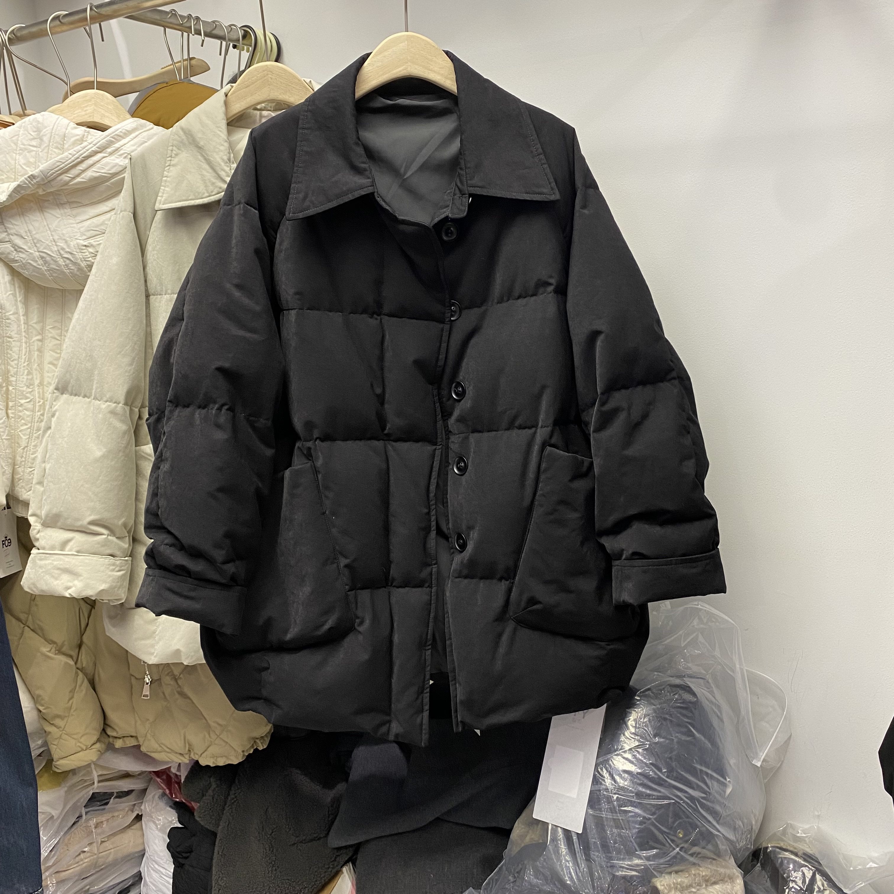 欧洲站冬季新款今年流行的翻领斜口袋中长款90白鸭羽绒服外套女潮