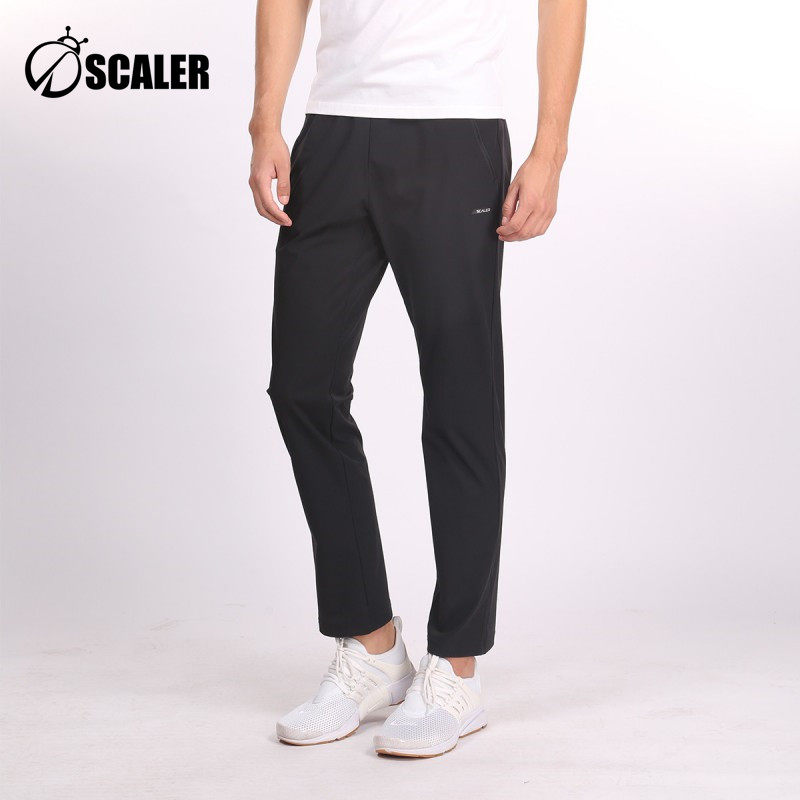 思凯乐F9030786春夏男女弹力长裤防泼水休闲登山徒步裤子F9130785