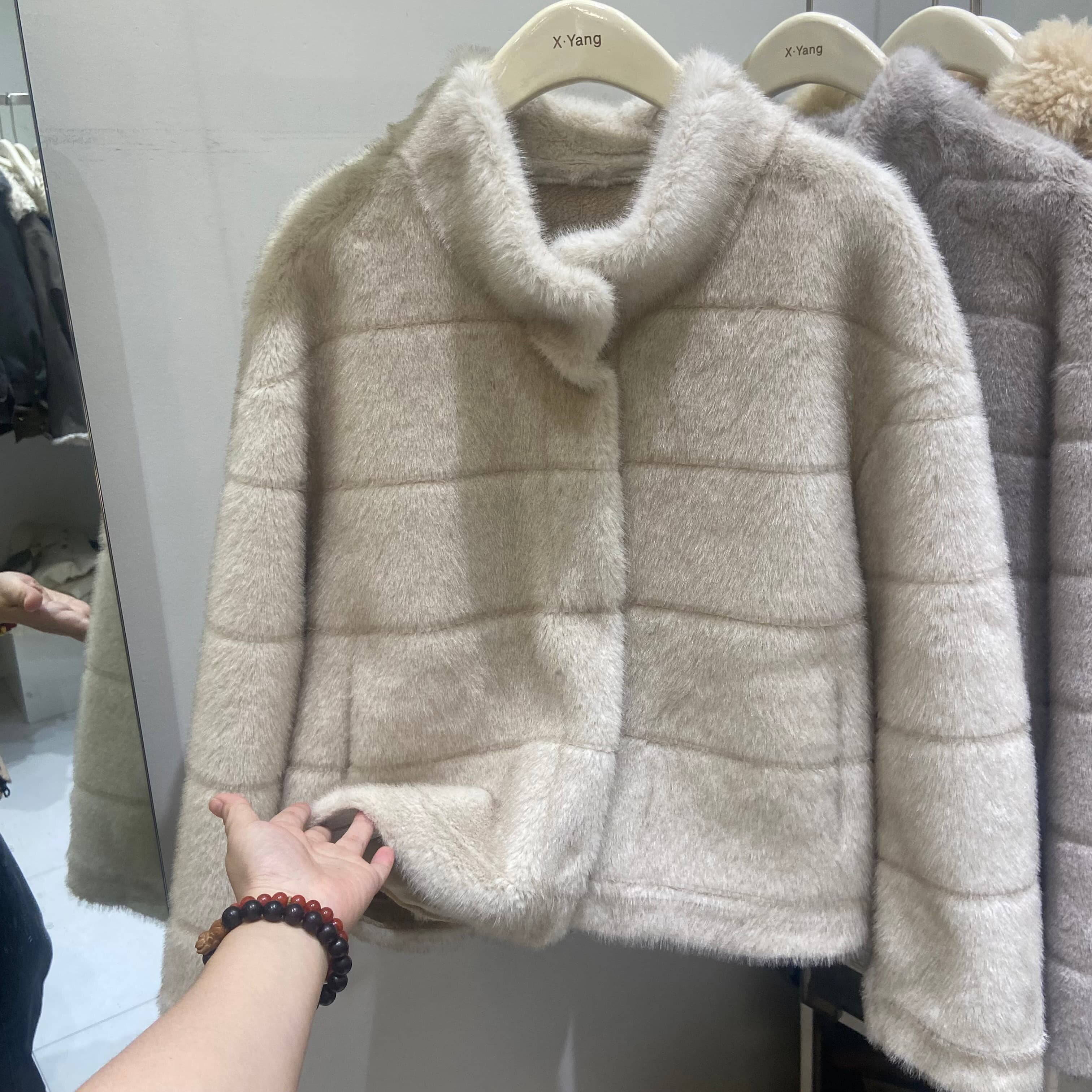 韩版立领暗扣仿水貂皮毛一体保暖外套女2025冬环保皮草高级感轻奢