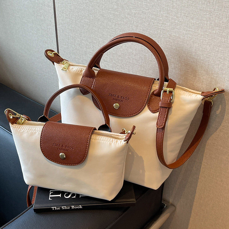 高级质感尼龙包包女包2025新款休闲斜挎小方包大容量百搭通勤包,箱包皮具/热销女包/男包,小方包,淘宝优惠券,粉丝福利购,淘宝优惠卷