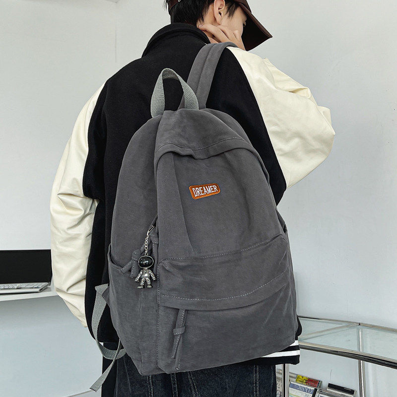 港风覆古书包男大容量高中学生大学生纯色日系揹包潮帆布双肩包女