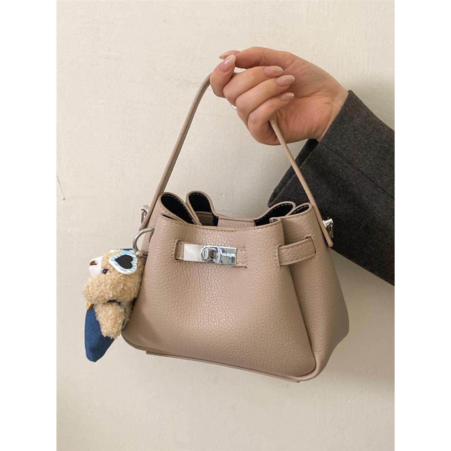 小拎包包女式2026新款小众轻奢高级感单肩包上班通勤退鞋款水桶包,箱包皮具/热销女包/男包,水桶包,淘宝优惠券,粉丝福利购,淘宝优惠卷