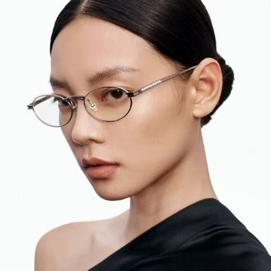 前进峰韩版珍珠椭圆平光墨镜女
