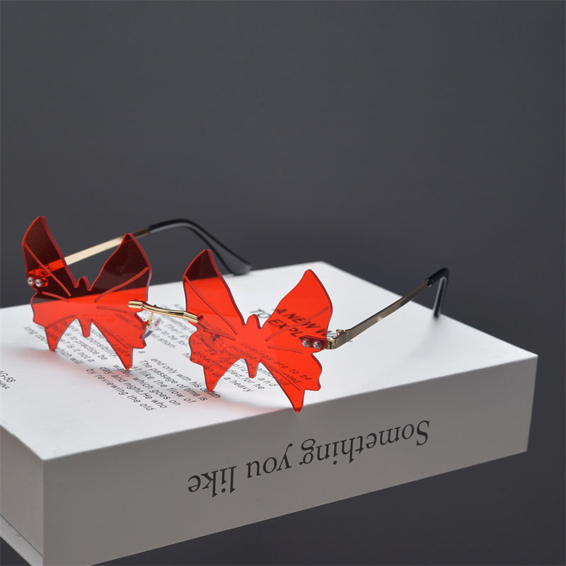 2024新款蝴蝶形无框切边墨镜男女潮搞怪个性海洋片糖果色太阳眼镜