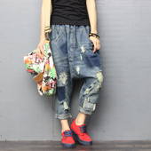 烂牛仔休闲裤 做旧深蓝色松紧腰宽松牛仔裤 哈伦裤 破洞潮大码 女垮裤