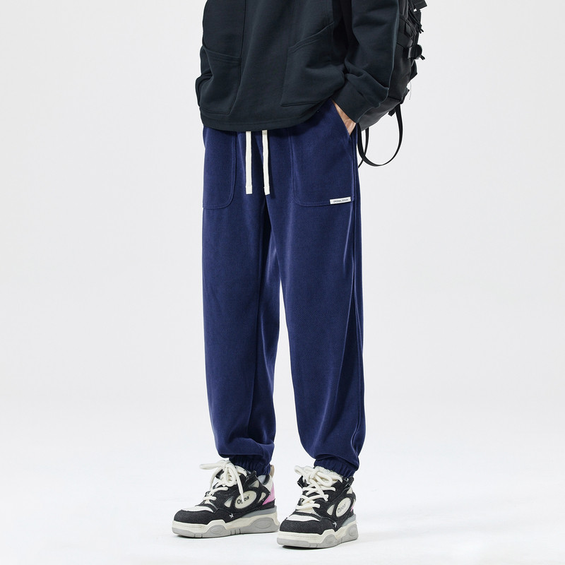 男士蓝色卫裤男秋季潮牌男裤休闲新款裤子男款痞帅美式运动裤束脚