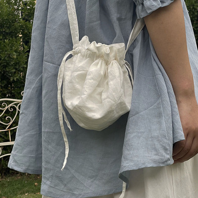 日系亚麻花边小圆包thetree树