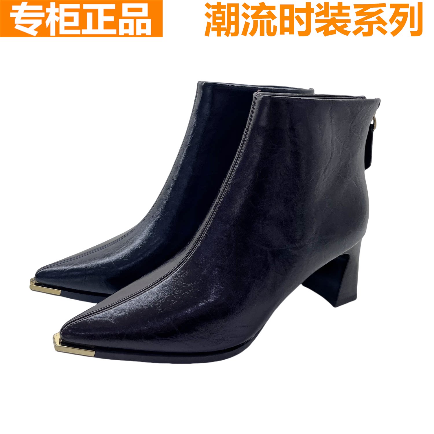 红蜻蜓真皮高跟短筒女靴子